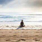 woman sitting on seashore