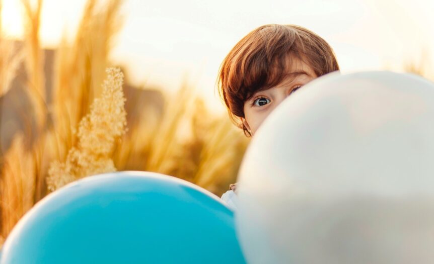 woman hiding on balloon