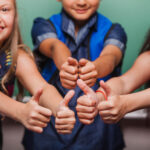 crop pupils with thumbs up 2