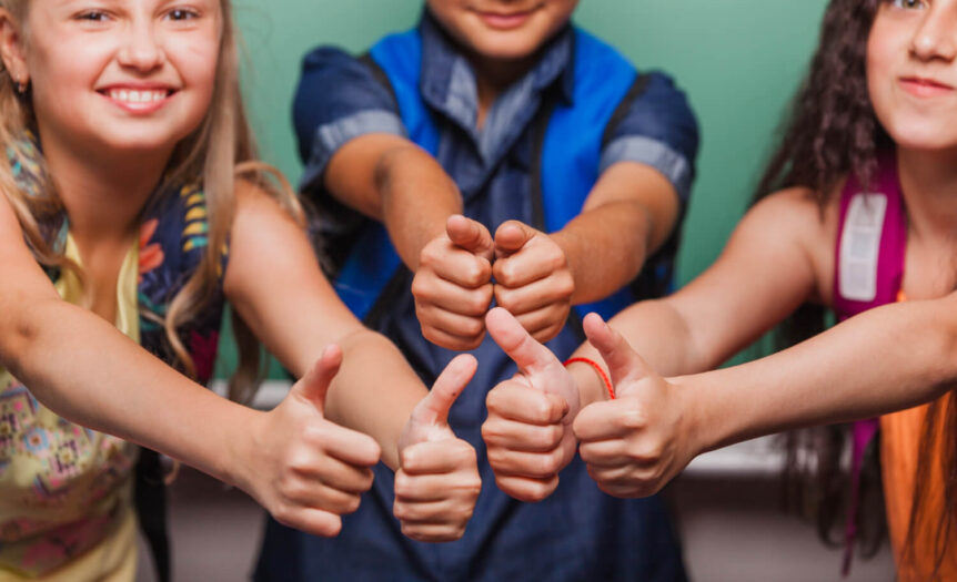 crop pupils with thumbs up 2