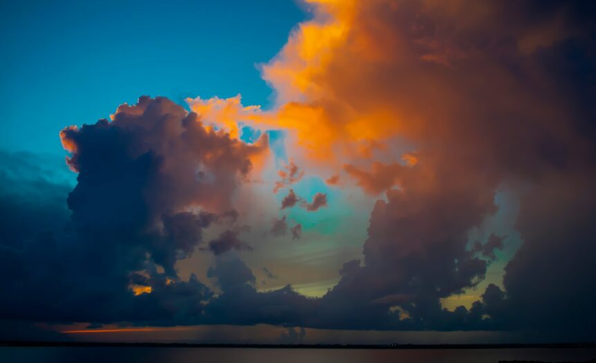 body of water during golden hour