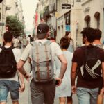 group of people walking on street during daytime