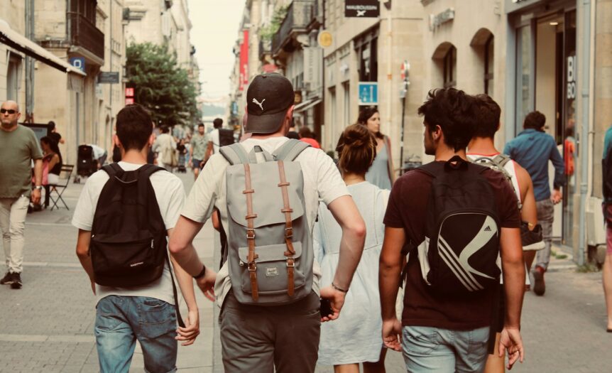 group of people walking on street during daytime