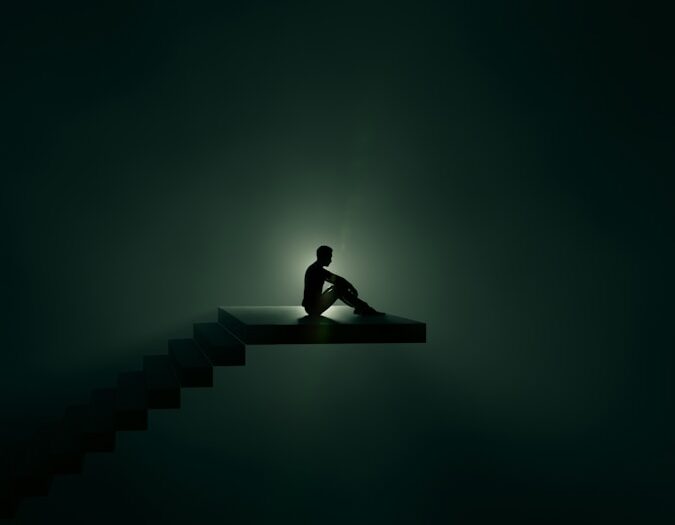a person sitting on a bench
