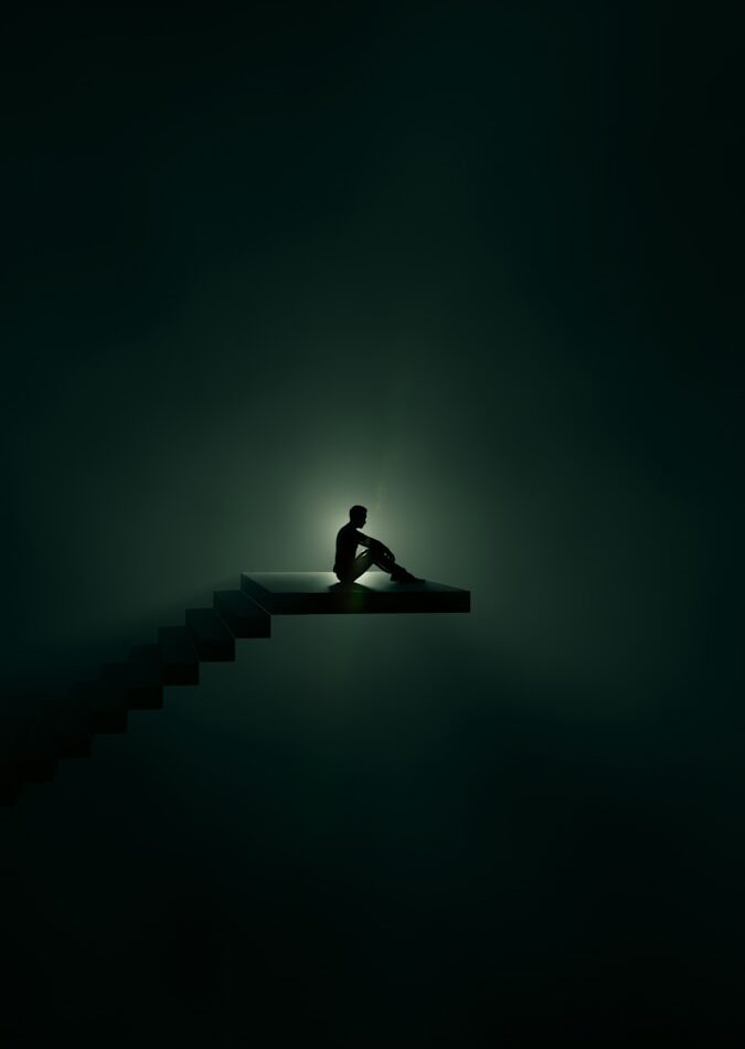 a person sitting on a bench