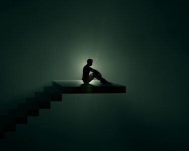 a person sitting on a bench