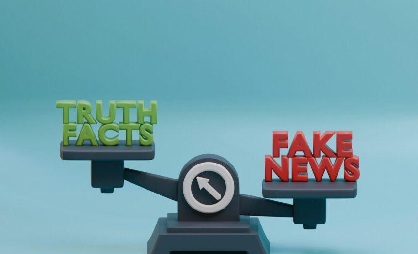 a scale with the words fake news on it