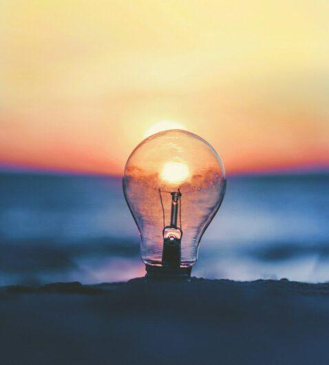 selective focus photography of light bulb